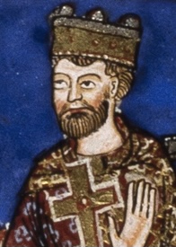 Detail of a miniature depicting Henry II. He is crowned, wearing royal regalia, and holding a golden cross in his right hand. His left hand is raised.