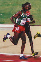 Bronzemedaillengewinner Assefa Mezgebu (grünes Trikot)