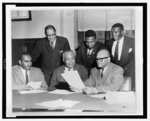 Clarence Mitchell Jr. (seated, bottom left), William Holmes Borders (seated, bottom center), and A. T. Walden (seated, bottom right), 1950.