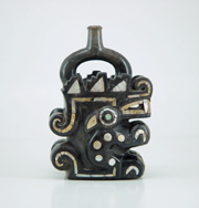 Moche Crawling Feline, a stirrup spout vessel with shell inlay, from c. 100–800 CE