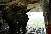 Airmen of the 710th Special Operations Wing prepare to jump from a KC-130 during Parachute Operations training.