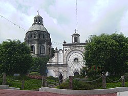 The half-buried San Guillermo Parish Church