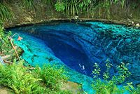 Deep-blue waters of the renowned "Hinatuan Enchanted River", an underground river in Barangay Talisay, Hinatuan