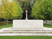 A stone inscribed with the words "Their Name Liveth For Evermore"