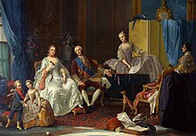 A family sitting in a luxurious salon. The mother, a middle-aged woman in white, is sitting in the front-left, next to her is the father in brown with golden embroidery. Behind them and on their right is Isabella in light purple, showing her father a drawing. On the other side of the couple are two small children playing with a sword, a boy in blue and a girl in yellow. An older woman, the governess of the children is also visible from the back in the far-right of the picture.