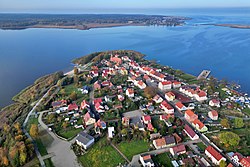 Aerial view of the town center and Nowe Warpno Bay