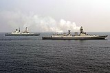INS Kolkata and HMS Defender during an exercise.