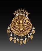 Earring with four-armed Vishnu riding Garuda with Nagas (serpent divinities); c. 1600; repousse gold with pearls; overall: 3.6 cm; from Nepal; Cleveland Museum of Art