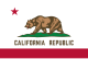 The state flag of California: a grizzly bear walking towards the hoist upon a grass plat centered in a field of white above the words CALIFORNIA REPUBLIC, with a red stripe below and a single red star above near the hoist