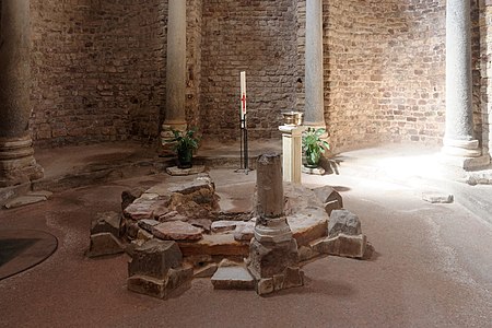 The baptismal font, large enough for a person to be immersed