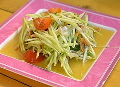 A variation of the salad with green mango instead of papaya and dried anchovies (tam mamuang pla haeng thot)
