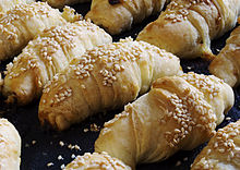 tray of rolls with sesame seeds