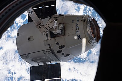 Dragon grappled by the ISS