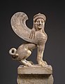 Marble capital and finial in the form of a sphinx, 530 BC