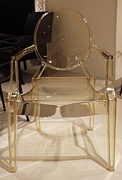 Louis Ghost, a simplified reinterpretation of armchairs in the Louis XVI style; by Philippe Starck; 2009; polycarbonate; height: 94 cm; various locations[134]