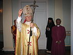 Pope John Paul II, Archbishop Desmond Tutu, the Dalai Lama, and Archbishop Makarios III