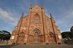 Colour photograph of the exterior of St Magnus Cathedral, Kirkwall Orkney, showing the main entrance