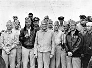 VADM William F. Halsey with members of his staff, c. 1941-42. His yeomen are at the far right: (from right to left) Yeoman I.N. Bowman; CY H.C. Carroll; and CY P.T. Hunt.