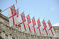Admiralty Arch is customarily decorated with White Ensigns on state occasions.