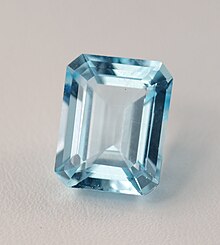 Blue topaz emerald-cut faceted gemstone