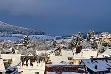 A German village with houses covered in snow