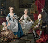 four children in eighteenth-century clothes