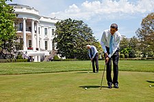 Barack Obama and Joe Biden on the putting green in 2009