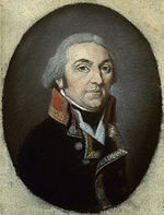 Color oval portrait of a gray-haired man in a dark blue military coat with a red collar