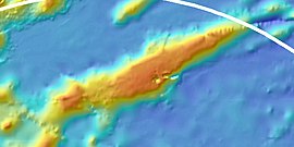 Colour-coded bathymetric map showing an elongated seamount