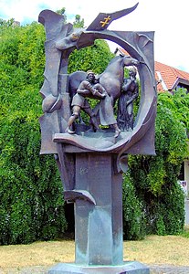 Statue of Saint Ladislaus in Szekszárd, Hungary (made by Benedek Nagy in 2001). The composition was based on the Ladislaus and Cuman warrior duel scene in the initial "P" in the Chronicon Pictum.