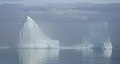August 1, 2007: The iceberg appeared in the morning fog stranded in shallow water at the harbour entrance.