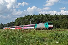 Long passenger train in a rural area