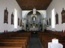 Interior of Church from front door. The altar is straight ahead.