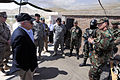 Secretary Gates talks with Chilean Special Forces alongside Texas Guardsmen