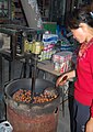 roasted chestnut vendor in China