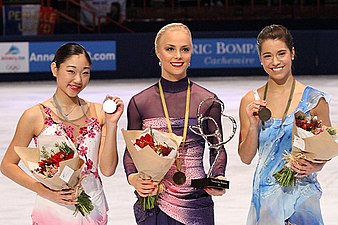Nagasu (left) at the 2010 Trophée Éric Bompard podium