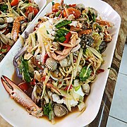 Lao papaya salad with selected crustacea, mollusks, and shellfish in addition to papaya strips