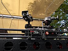 2 NEWTON stabilized heads on a remote controlled moving camera dolly for live TV broadcast