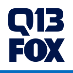 A white box with a royal blue underline. In a bold sans serif, the letters "Q13" with a stylized Q atop the Fox network logo, all in navy blue.