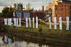 Art installation of flags on Aire in Leeds