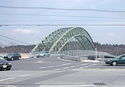 The arch bridge in Tyngsborough, Massachusetts, with the Temporary bridge alongside it in 2006