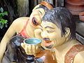 Image 15Vietnamese statues depicting the traditional practice of teeth blackening (nhuộm răng đen) (from Culture of Vietnam)