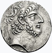 Coin with the bust of a hawk-nosed, bearded, curly-haired man wearing a diadem