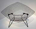 Knoll had Bertoia translate his sculptural work into furniture, resulting in his wire chairs.