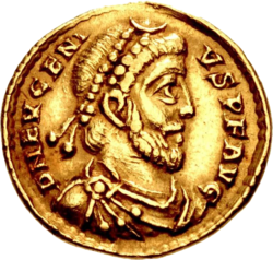 Golden coin depicting bearded man with military attire and diadem, facing right