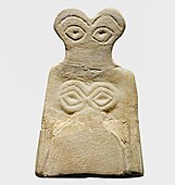 Eye idol; 3700–3500 BC; gypsum alabaster; 6.5 × 4.2 × 0.6 cm; Metropolitan Museum of Art