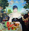 Watermelon and other fruit in Boris Kustodiev's Merchant's Wife