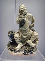 Blue underglaze statue of a man with his pipe, Jingdezhen porcelain, Ming Wanli period (1573–1620)