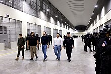 Nayib Bukele and four of his government officials touring the Terrorism Confinement Center (CECOT) before opening.