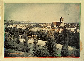 View of Agen, France, showing the St. Caprais cathedral, 1877. Heliochrome (multilayer dichromated pigmented gelatin process). George Eastman House